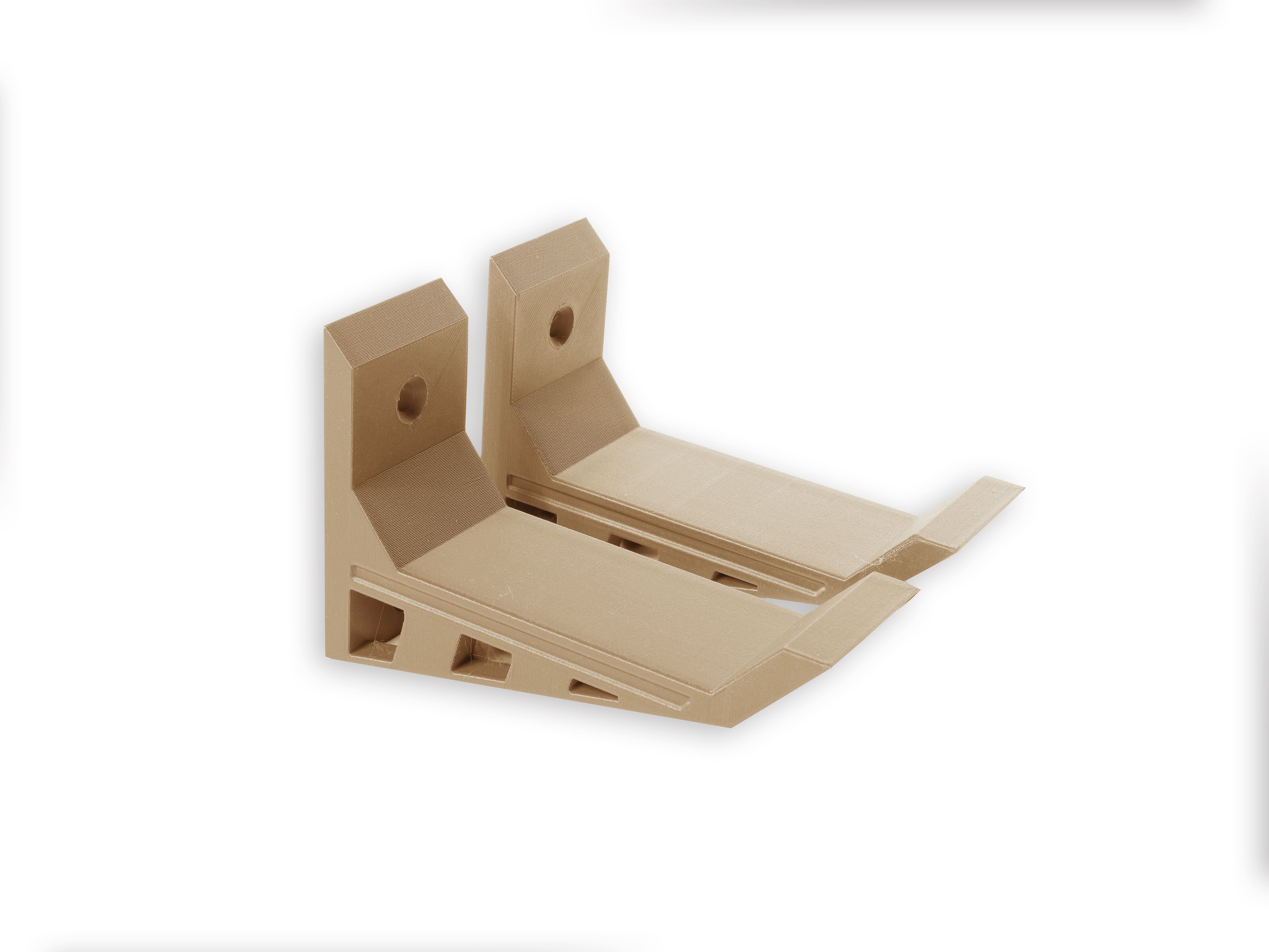 A pair of Gold, Nerf wall mounts, Screw in and adhesive install,  close-up on drywall